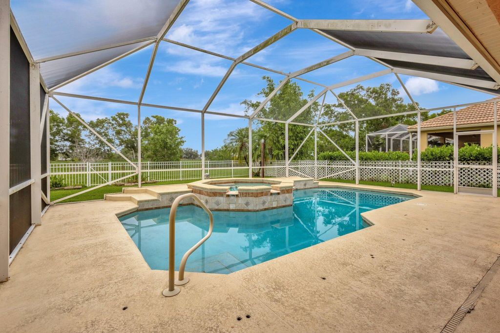 Photo of 303 NW Cheshire Lane, Port Saint Lucie, FL 34983 (MLS # R11101884)