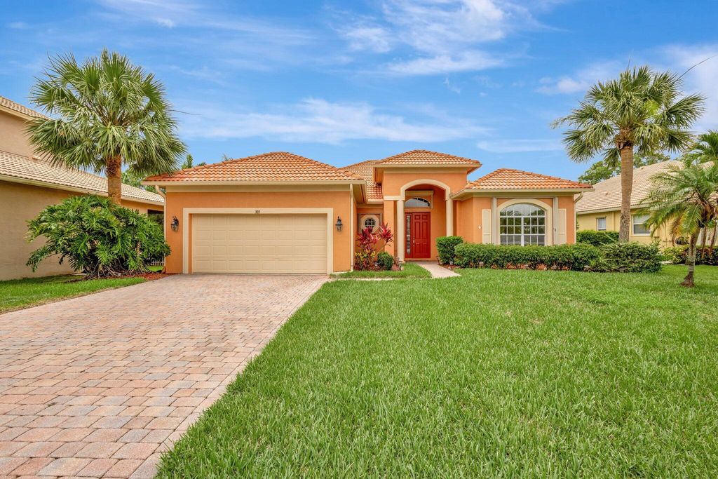 Photo of 303 NW Cheshire Lane, Port Saint Lucie, FL 34983 (MLS # R11101884)