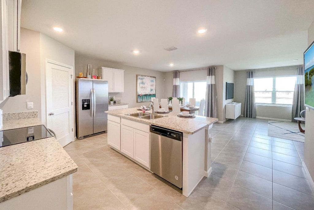 Photo of 9767 SW Triton Way, Port Saint Lucie, FL 34987 (MLS # R10956301)