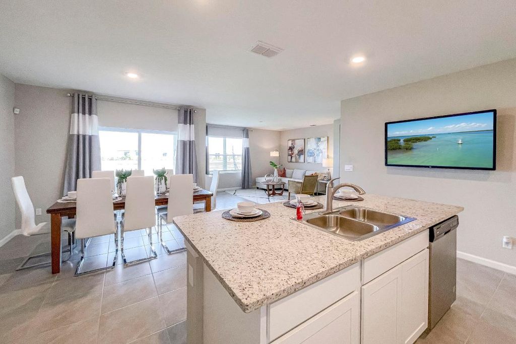 Photo of 9767 SW Triton Way, Port Saint Lucie, FL 34987 (MLS # R10956301)