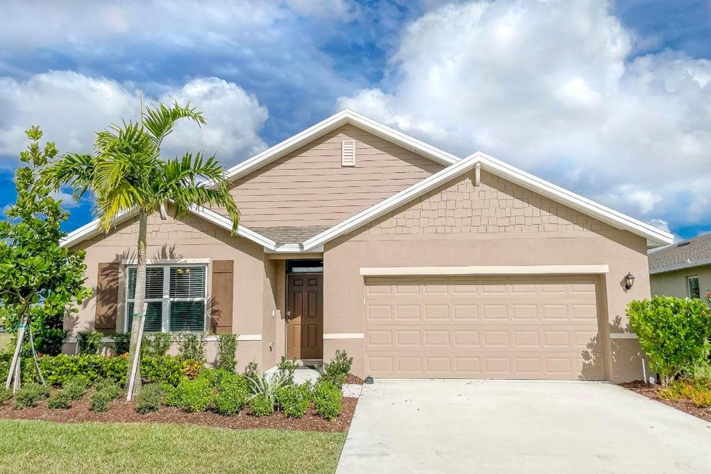 Photo of 9767 SW Triton Way, Port Saint Lucie, FL 34987 (MLS # R10956301)