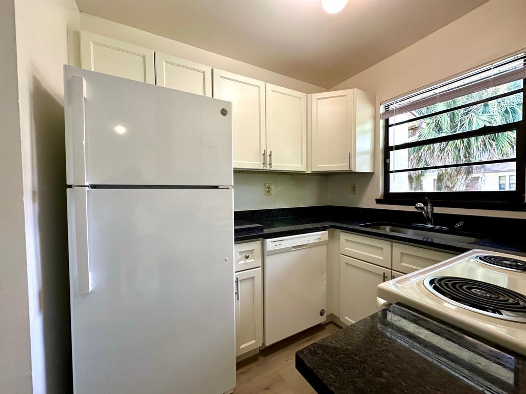 Photo of 1244 N Haverhill Road #4, Haverhill, FL 33417 (MLS # R11011274)