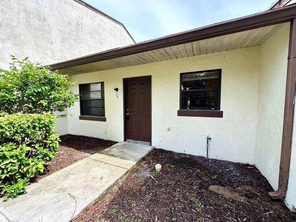 Photo of 1244 N Haverhill Road #4, Haverhill, FL 33417 (MLS # R11011274)