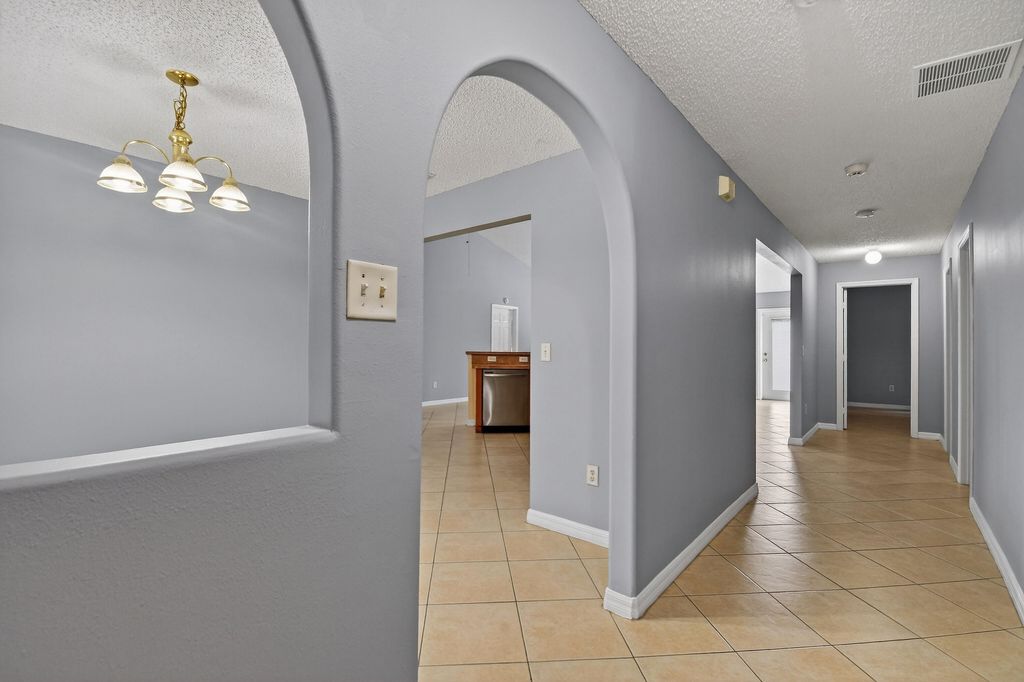 Photo of 4066 SW Canrady Street, Port Saint Lucie, FL 34953 (MLS # B26010595)