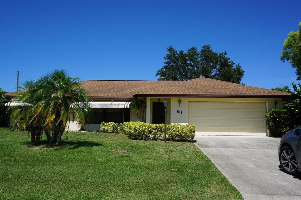 Photo of 811 SE Roulette Lane, Port Saint Lucie, FL 34983 (MLS # R10740250)