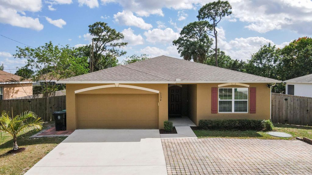 Photo of 1174 SW Goodman Avenue, Port St Lucie, FL 34953 (MLS # R10873953)