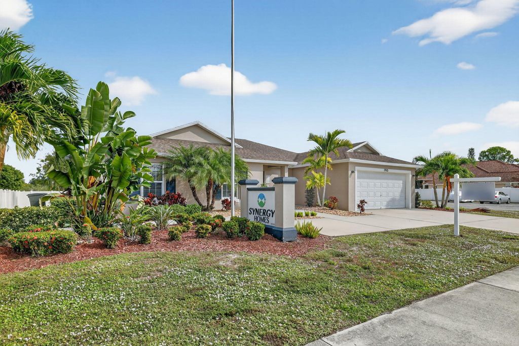Photo of 1965 SW Bayshore Boulevard, Port Saint Lucie, FL 34984 (MLS # R11143430)