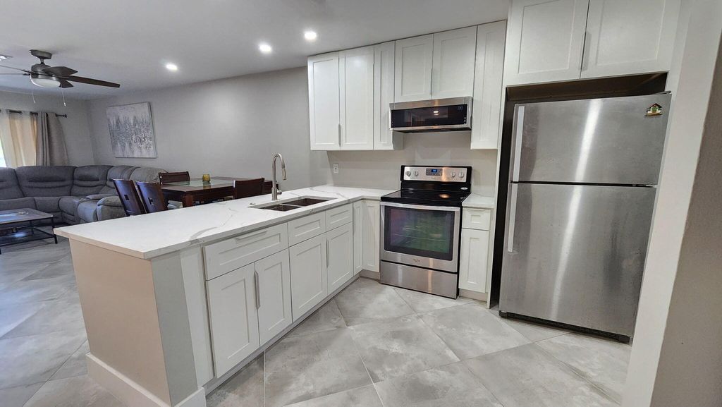 Photo of 8605 W Sample Road #311, Coral Springs, FL 33065 (MLS # B26005903)