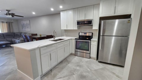Tiny photo for 8605 W Sample Road #311, Coral Springs, FL 33065 (MLS # B26005903)
