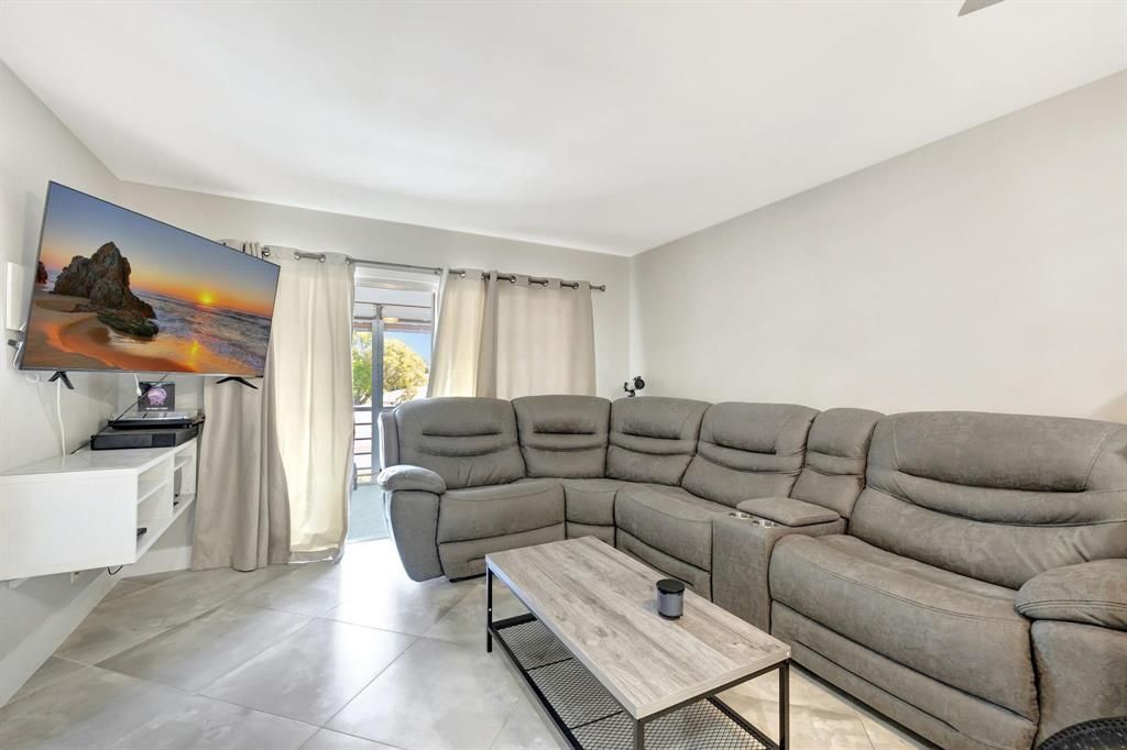 Photo of 8605 W Sample Road #311, Coral Springs, FL 33065 (MLS # B26005903)