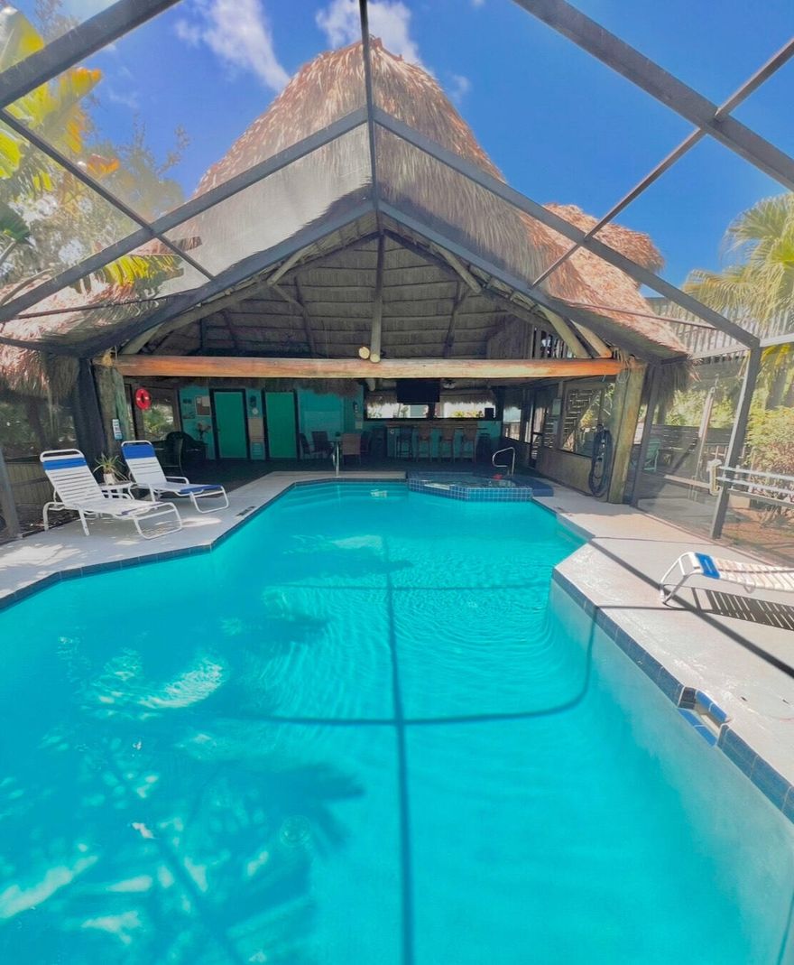 Discover Walden Woods—Port St. Lucie's hidden gem along the St. Lucie River with ocean access. This beautifully maintained 2BR/2BA villa-style condo with garage features vaulted ceilings, crown molding, tile floors throughout, and tranquil preserve views. Enjoy two screened porches—ideal for morning coffee or sunset dining.

Recent updates include a new roof (2024), newer AC (2020), updated electrical panel (2024), newer water heater, accordion hurricane shutters, and Ring doorbell. The bright eat-in kitchen offers white cabinetry, stainless appliances, and pantry. The primary suite has private porch access and a walk-in shower; the guest room features loft storage.
Community amenities include a heated pool, spa, tiki bar lanai, and sundeck overlooking the preserve.