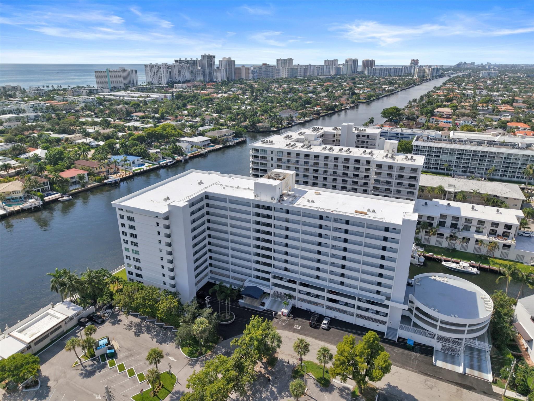 Experience the essence of coastal living in this beautifully updated condo, perfectly situated in the heart of Lauderdale-by-the-Sea—just steps from the sandy beach. This town has it all; boutique shops, charming cafés, outdoor dining, and year-round events are always within reach. Inside, the home is designed for both comfort and style. A massive sunroom with floor-to-ceiling windows frames offer panoramic waterviews—the perfect setting as you sip your morning coffee, watching boats drift by. This condo is equipped with spacious bedrooms and walk-in closets, and other updated finishes throughout. The beach decor creates a refined yet relaxed atmosphere that captures the true spirit of Intracoastal living. Here, every day feels like a getaway.