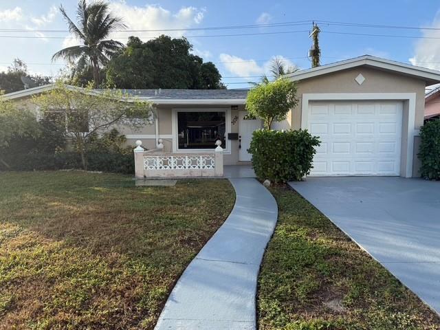 INCREDIBLE CONDITION FOR THIS PRICE! YOU WILL NOT WANT TO MISS THIS. HOME IS READY TO SHOW, EASY TO SEE! COMPLETELY REMODELED! 3/2, DEN & 1 CAR GARAGE. NEW ROOF, IMPACT WINDOWS, CENTRAL AIR, LAMINATE FLOORING, ALL INTERIOR DOORS - ALL NEW. ALL NEW KITCHEN WITH QUARTZ COUNTERTOPS, STAINLESS STEEL APPLICANCES AND NEW FIXTURES. NEWLY MODERN BATHROOMS, CABINTRY, LED MIRRORS, TILE AND FIXTURES. FRESHLY PAINTED. UPDATED UTILITY ROOM WITH NEW WASHER & DRYER, COUNTERTOPS AND HOT WATER HEATER. FRUIT TREES INCLD BANANA, MANGO, SOURSOP, COCONUY, PASSION FRUIT, PIGEON PEARS & SUGAR CANE. AMAZING HOME. (PARTIAL VIRTUAL STAGING)