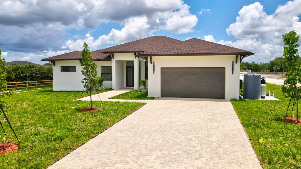 Photo of 2324 DEER RUN Trail, The Acreage, FL (MLS # B26052327)