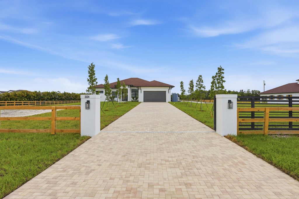Photo of 2324 DEER RUN Trail, The Acreage, FL (MLS # B26052327)