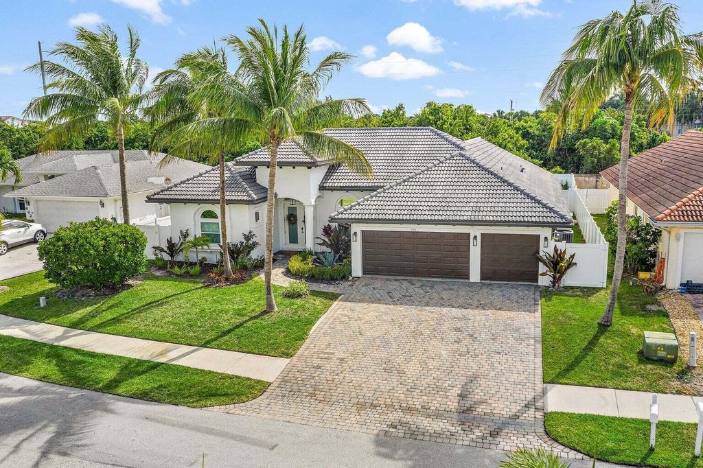 Photo of 596 N Cypress Drive, Tequesta, FL 33469 (MLS # R11048784)