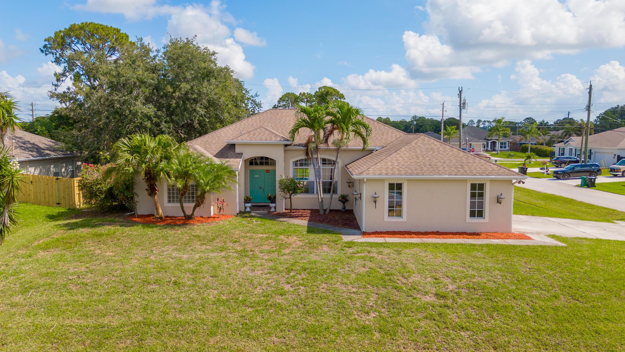 This is the Ideal Screened-In Pool Home You Have Been Looking For! Move In Ready, It's The Perfect Blend of Space and Comfort Sitting on an Oversized Corner Lot. It Has 4 Bedrooms and 2 Baths with One Non-Conforming Bedroom Currently Being Used as an Office. Naturally Light Filled This Home Offers an Open Floor Plan, Vaulted Ceilings and a Spacious 2,396 SF. There is a Cozy Breakfast Bar as well as a Formal Dining Room. Other Notable Features Include Stainless Steel Appliances, Tile Flooring, Triple Split Bedrooms, and Ceiling Fans. A Must-See Home Conveniently Located Near 95 And the Shopping and Dining of South Pt. St Lucie. The Seller Is Motivated So Call Today to Schedule Your Private Showing.