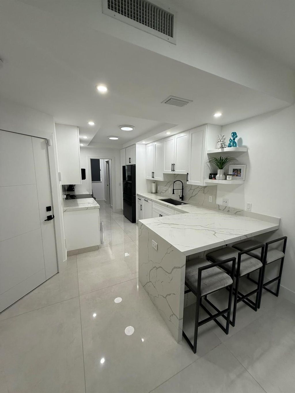 Photo of 500 Capistrano Drive, Palm Beach Gardens, FL 33410 (MLS # R11131007)