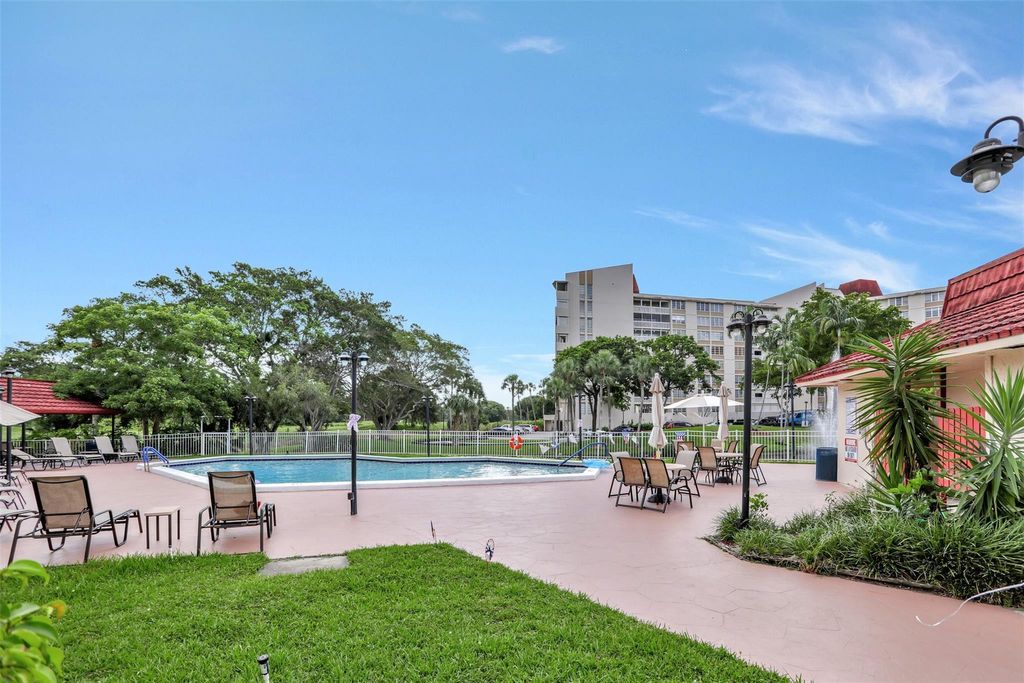 Photo of 6921 Environ Boulevard #6o, Lauderhill, FL 33319 (MLS # B26020598)
