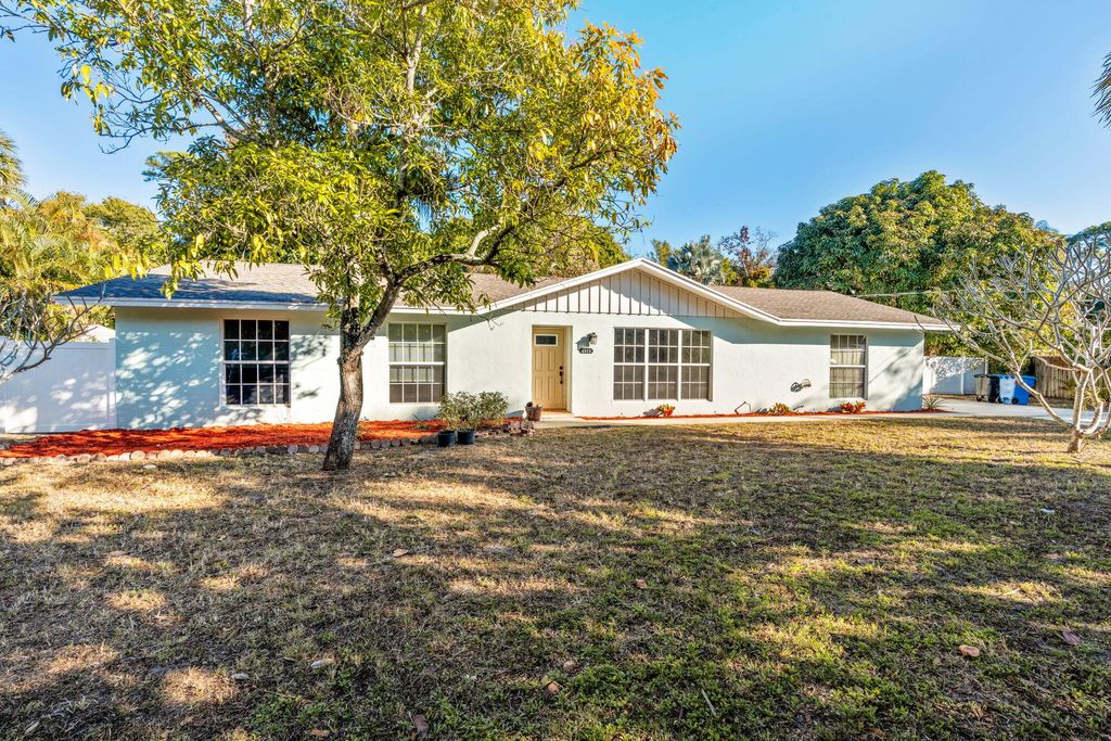 Photo of 5213 Bethany Lane, Haverhill, FL 33415 (MLS # R11162910)