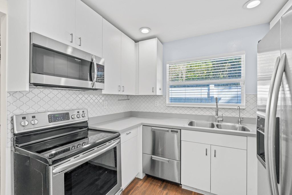 Photo of 5213 Bethany Lane, Haverhill, FL 33415 (MLS # R11162910)