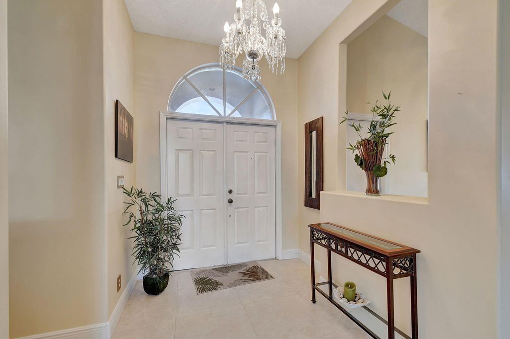 Photo of 141 Egret Circle, Greenacres, FL 33413 (MLS # R11044219)