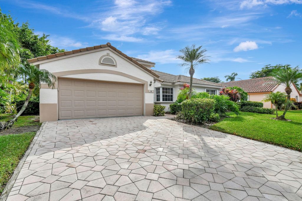 Photo of 141 Egret Circle, Greenacres, FL 33413 (MLS # R11044219)