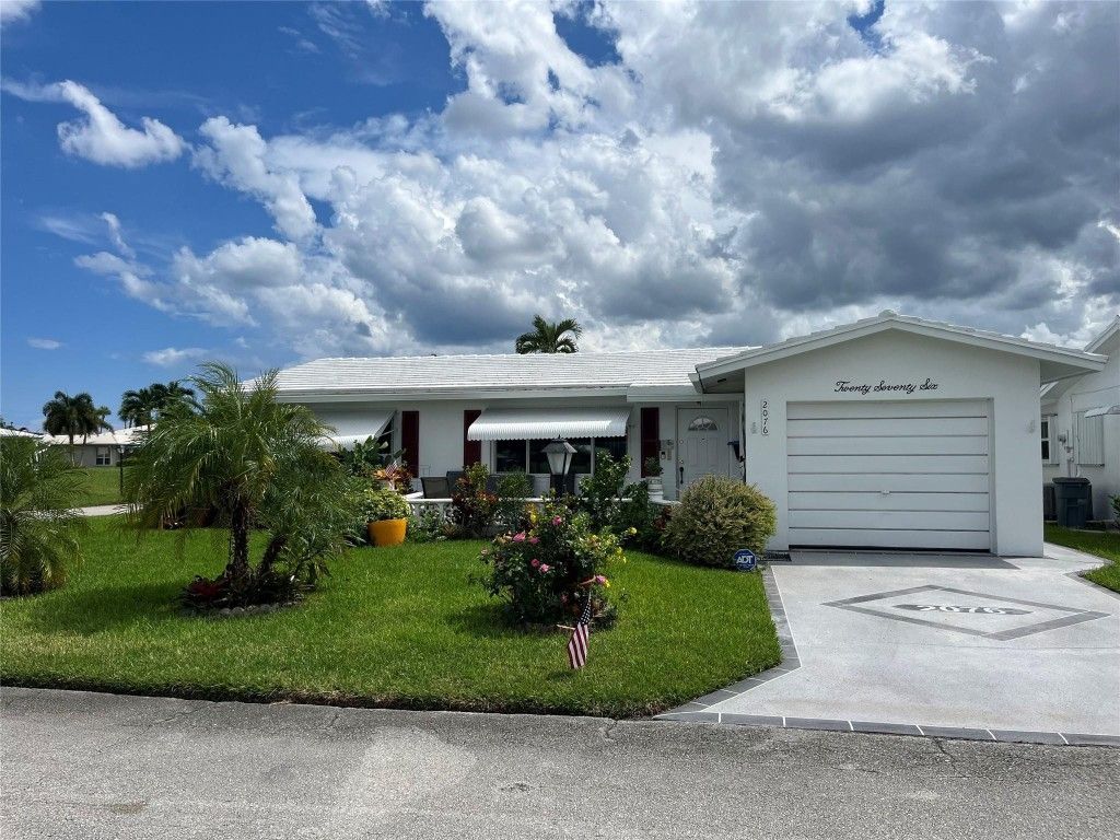 Photo of 2076 SW 12th Avenue, Boynton Beach, FL 33426 (MLS # F10524000)