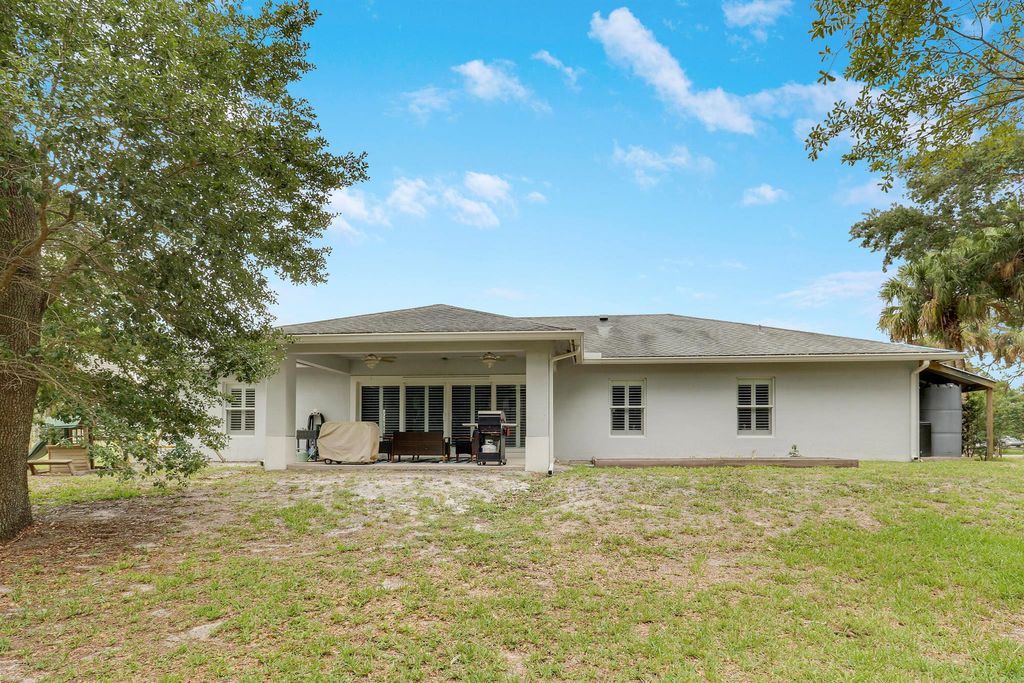 Photo of 15741 97th Road N, West Palm Beach, FL 33412 (MLS # R11092750)