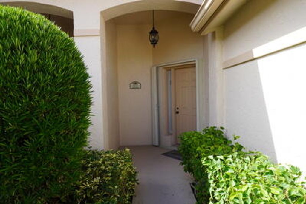Photo of 877 Windermere Way, Palm Beach Gardens, FL 33418 (MLS # R11080362)