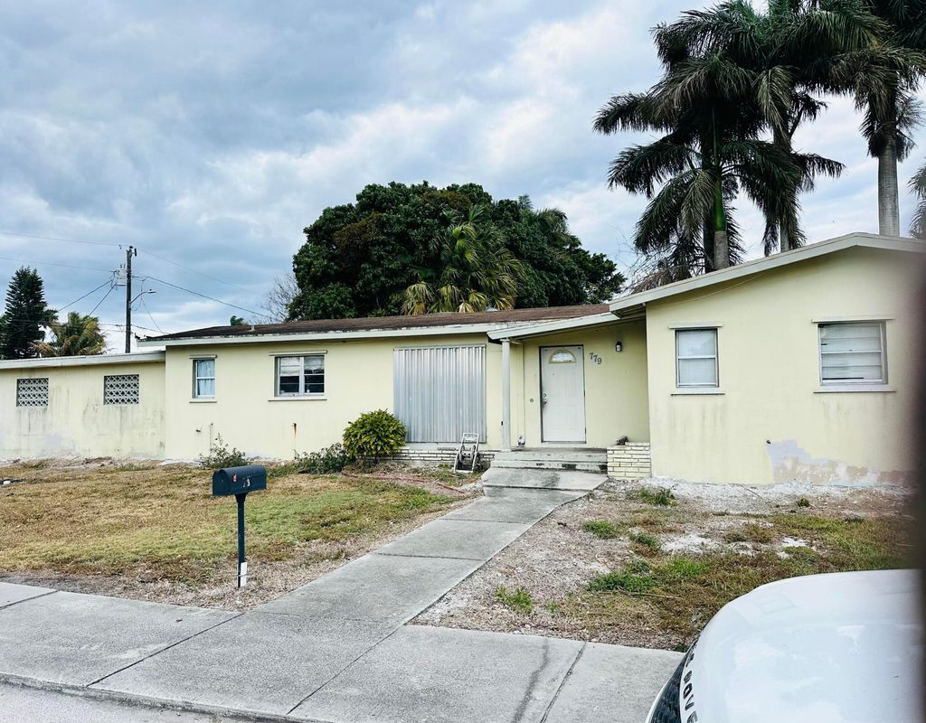 Photo of 779 Barack Obama Boulevard, Pahokee, FL 33476 (MLS # B26023850)