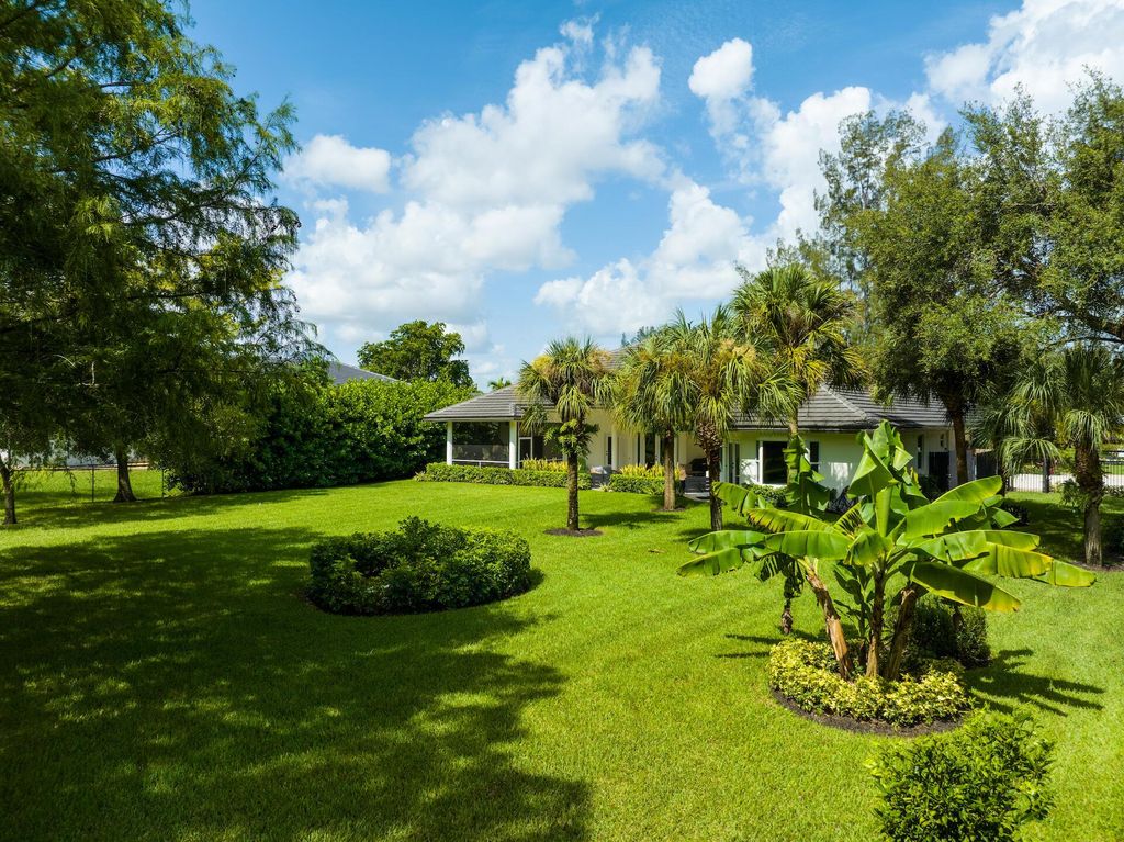 Photo of 6836 NW 66th Way, Parkland, FL 33067 (MLS # R10906081)
