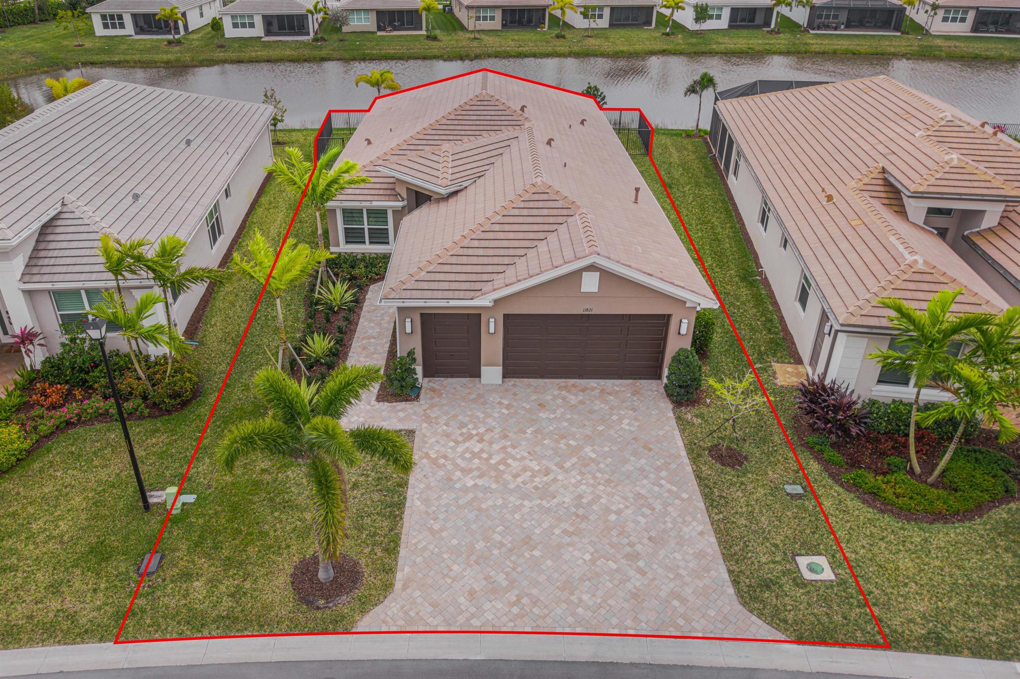 Resort style Living in Riverland ''Valencia Grove'' a 55 + gated community. Home has a beautiful Lake View (Premium Waterfront Lot) with your very own Inground Pool. Pool has been pre-wired for a Pool Heater. This floor plan is called the ''Palazzo'' which has 3 bedrooms, 2.5 bathrooms and a Den. Tiled Floors throughout the Living Areas. The garage has been extended to accommodate larger vehicles (26' 5'' wide X 21' 7'' Length). Kitchen has upgraded cabinetry, quartz countertops, and upgraded SS appliances. The outside porch is pre wired and plumbed for a Summer Kitchen. The Windows and Doors have custom blinds. All Windows and Doors are impact rated for Hurricane Protection.