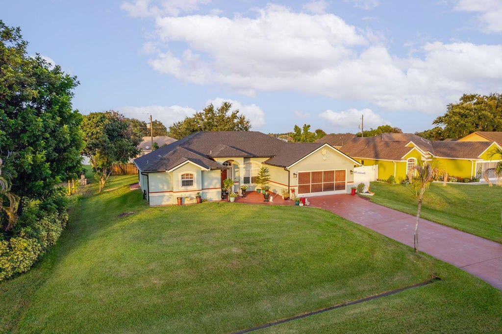 Photo of 1871 SW MONTERREY Lane, Port Saint Lucie, FL 34953 (MLS # B26066824)
