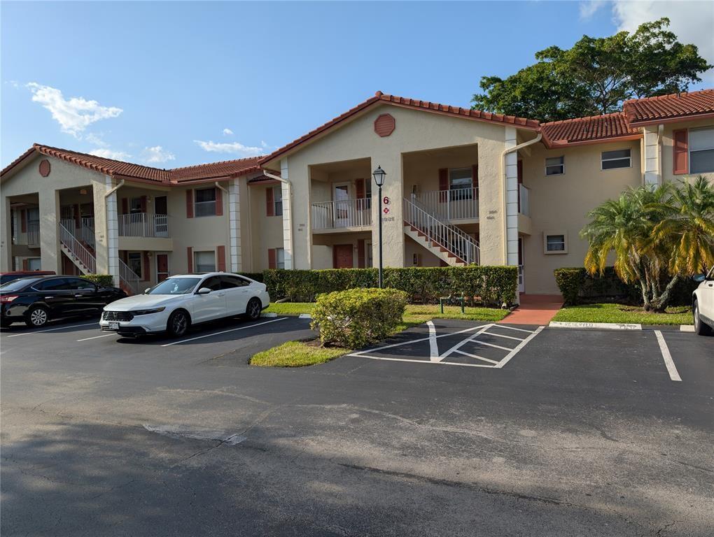Move right into this beautiful 2-bedroom, 2-bath condo located in the highly desirable Golfside community of Holiday Springs. This spacious and updated unit offers vaulted ceilings, wood flooring throughout, and a modern kitchen with granite countertops. The full-size washer and dryer are conveniently located on the enclosed balcony, and a newer A/C ensures your comfort. Residents enjoy access to Golfside’s private screened pool as well as the impressive amenities of Holiday Springs Village, including a resort-style pool, clubhouse, fitness center, and more. This is an active 55+ community offering comfort, convenience, and a vibrant social lifestyle. Schedule your tour today!