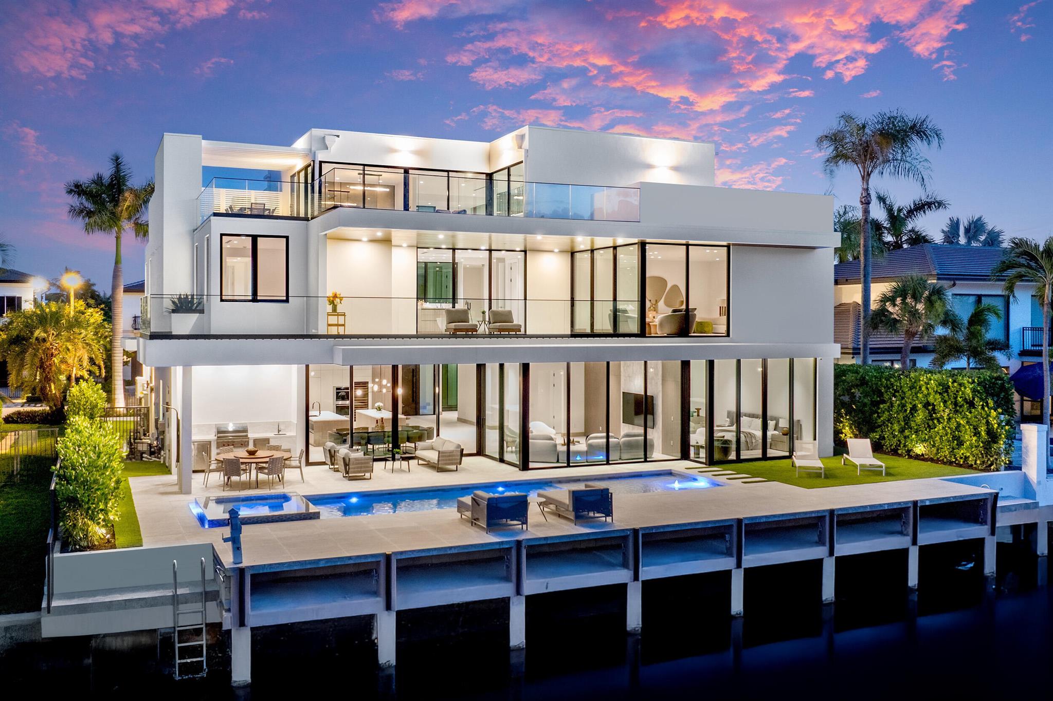 Brilliantly staged in Boca Raton's prestigious Golden Harbour enclave, this newly completed three-story estate by Empire Development redefines luxury waterfront living. Encompassing nearly 10,000 square feet of indoor-outdoor living space within a secure, gated setting, this architectural triumph showcases Empire's signature originality. From world-class finishes to unmatched amenities and a coveted location, every detail of this designer residence embodies modern elegance at its finest.Now complete and ready for its discerning owner, 541 Golden Harbour Drive is a newly unveiled masterpiece offering an unparalleled living experience defined by exceptional scale, masterful detail, and timeless