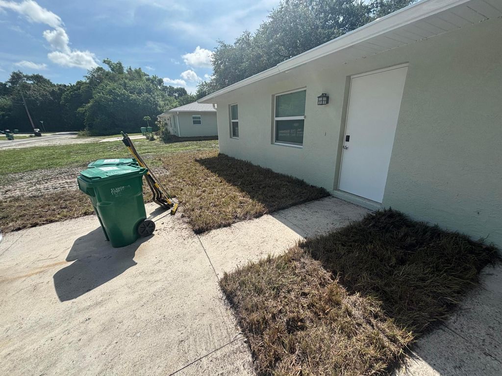 Photo of 2147 Sibley Ave, Fort Pierce, FL 34982 (MLS # B26010199)