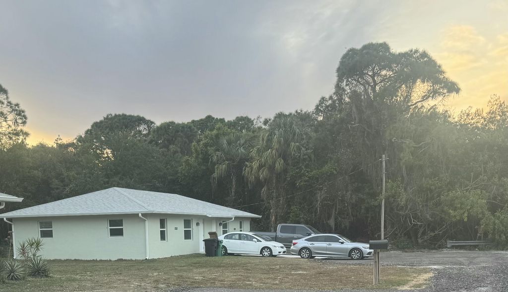 Photo of 2147 Sibley Ave, Fort Pierce, FL 34982 (MLS # B26010199)