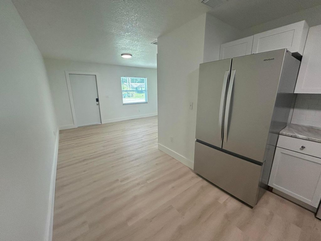 Photo of 2147 Sibley Ave, Fort Pierce, FL 34982 (MLS # B26010199)