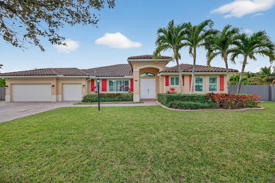 Redland Reef ranch home on quiet, low-traffic street—just 35 mins to the Florida Keys! Low HOA! Split 4BR/3.5BA plan. 2024 upgrades: Elite Stoneform flooring, custom kitchen, new appliances, impact windows/doors, whole-house water filtration, & epoxy 3-car garage, fencing with rolling gate and 50x14 concrete pad—ideal for a boat, RV, or work vehicle. Septic pumped 2024. Backyard starfruit tree. HOA will allow commercial work vehicles. Bright, spacious living areas near parks, schools, and shopping. Outdoor Fun; take a quick drive to John Pennekamp in the Keys, reach the Everglades in 10 minutes, or stroll the tropical gardens at Fruit & Spice Park. Fresh local produce just 5 minutes away at Robert is Here Fruit Stand. (Tesla charger, video surveillance, washer/dryer not included in sale)