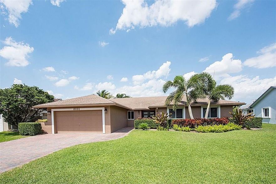 Walk in and fall in love with beautifully updated, move in ready home. Fantastic lake views, impact windows and doors. Fabulous kitchen with White Quartz counter tops, designer tile,  Top of the line Stainless steel appliances and wood cabinets. Minutes from A rated Davie schools, shopping and highways.