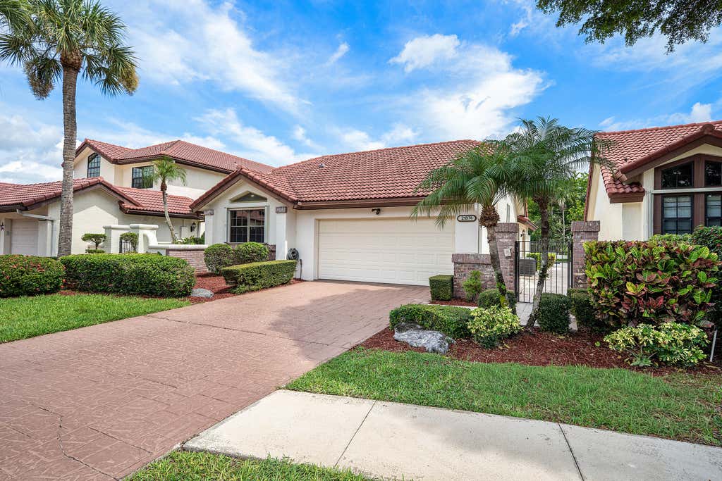 Photo of 21874 Town Place Drive #21874, Boca Raton, FL 33433 (MLS # B26058414)