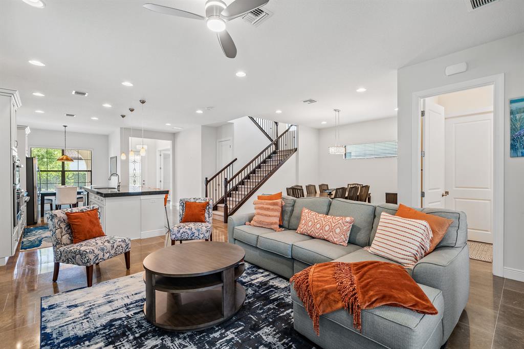 AMAZING location in Alton!! Walk, bike or drive your golf cart to Alton Town Center for the best shopping & dining in the area. This beautiful home built in 2018 is a Park D/Lancaster model featuring 4 bedrooms with the primary & laundry on the ground floor. Three large bedrooms upstairs with 2 full baths. This home has a beautiful open floor plan with many upgrades including gorgeous stone flooring, 36'' Monogram range top with 6 burners, 36'' GE profile chimney hood, 3'' blue quartz countertops, natural gas cooktop/water heater/gas dryer, impact glass windows & spray foam insulation. Casita can be included for an additional fee.