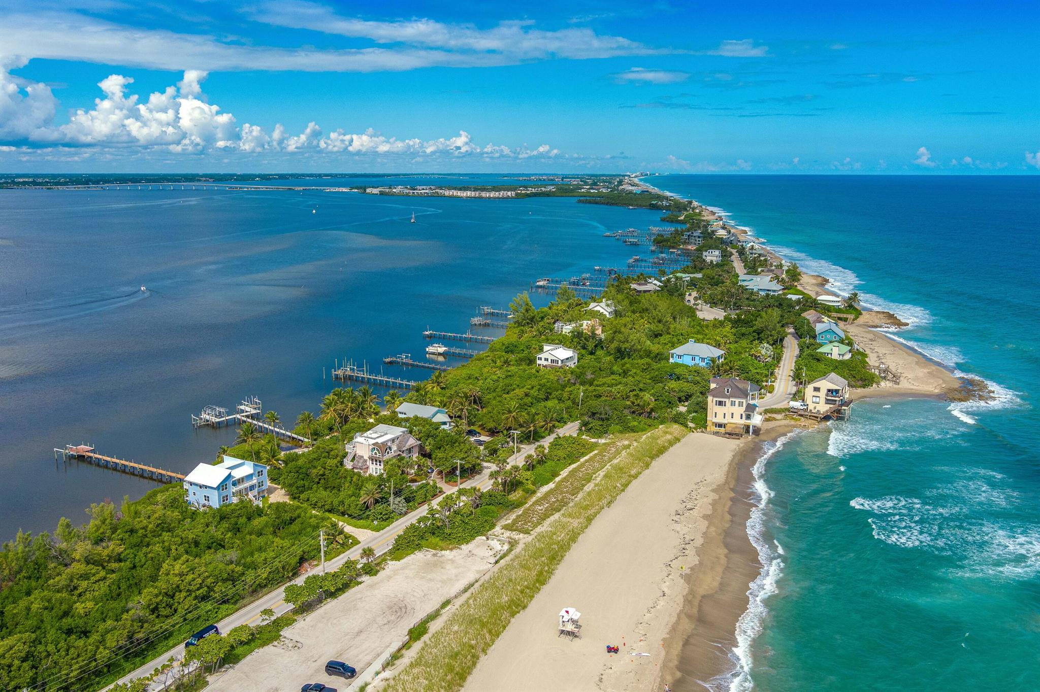 Ocean to River Masterpiece! Stunning ocean and river views, 3- bedroom home is meticulously furnished with your comfort and serenity in mind: open layout with high ceilings, modern kitchen, formal dining room, spacious bedrooms with direct water views, jetted tub and steam shower. Island location is a few steps to the beach. Relax on the dock while enjoying fabulous sunsets. Head out to dinner in Sewell's point or Stuart; shop at the local markets or the various historical downtown boutiques. Come experience the very best living on Hutchinson Island. Welcome to your perfect Florida retreat! Taxes may be added for term under 6 months. Price is subject to change according to on / off season.