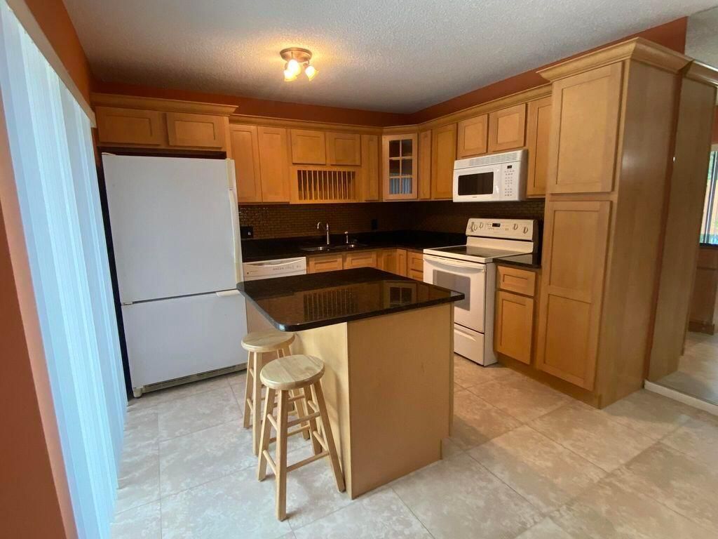 Photo of 5693 SE Windsong Lane #545, Stuart, FL 34997 (MLS # R10949322)