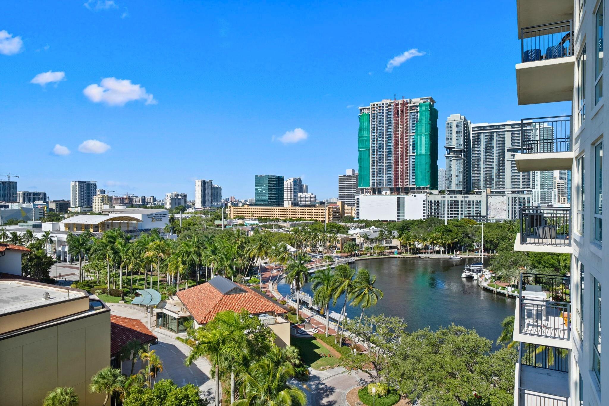 Enjoy resort-style living at The Symphony, a gated riverfront condo in downtown Fort Lauderdale. This split-bedroom layout offers two primary suites with walk-in closets with custom built-ins & spa-like baths featuring oversized soaking tubs, showers, & a separate tub & walk-in shower in the main suite. The open living space includes tile flooring, granite countertops, stainless steel appliances, & large windows with plantation shutters. Two private terraces, one off each bedroom, offer stunning views of the New River & downtown, ideal for sunrise & sunset. Amenities include a grand two-story lobby, 24/7 security & valet, business center, club room, fitness center, heated pool & spa, salon, billiards, wine room, theater, & more. Just moments from Las Olas dining, shopping, & entertainment.