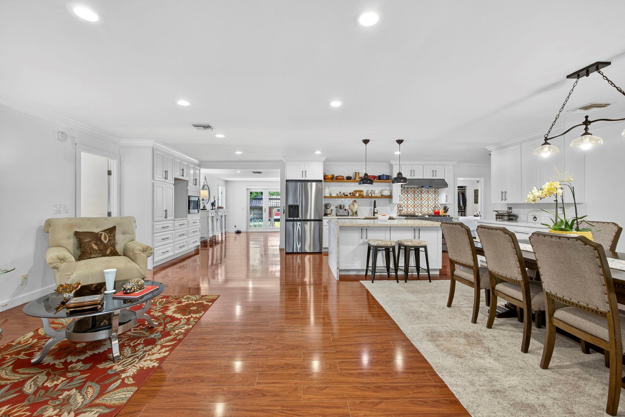 Welcome to The Acreage!  where country charm meets modern comfort! Single-family Home, with Spacious 3-Bedrooms, 2 Bathrooms plus 3 half bathrooms Ranch. Enjoy a bright, open-concept layout with a welcoming living area that flows seamlessly into the kitchen and dining spaces — perfect for everyday living and entertaining. Set on a generous lot, this property is a true outdoor paradise. Enjoy your mornings surrounded by, lush fruit trees, gather fresh eggs from your own chickens. The property also offers income potential with outdoor event rentals. Whether you’re looking for a family home, an investment, or both, this property is a rare find with endless possibilities! Experience the best of The Acreage lifestyle — space, freedom, and opportunity!