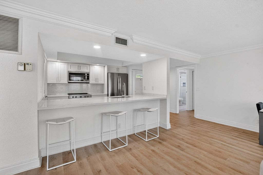 Photo of 20033 Boca West Drive #3055, Boca Raton, FL 33434 (MLS # B26006207)