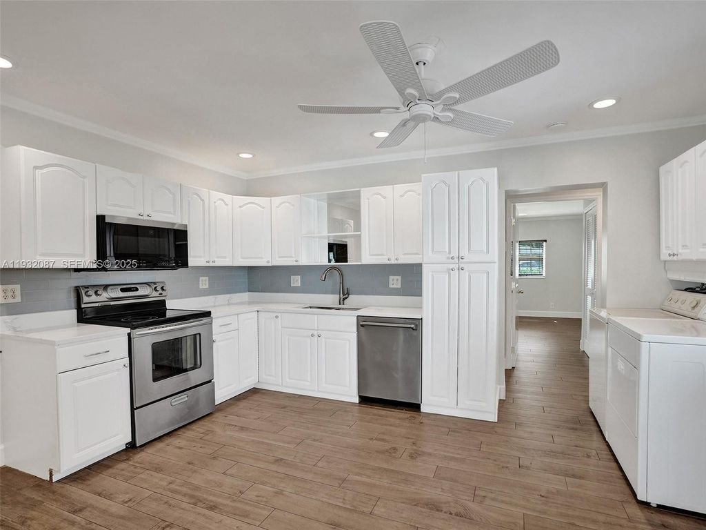 Photo of 1205 Guava Isle, Fort Lauderdale, FL 33315 (MLS # F10549479)