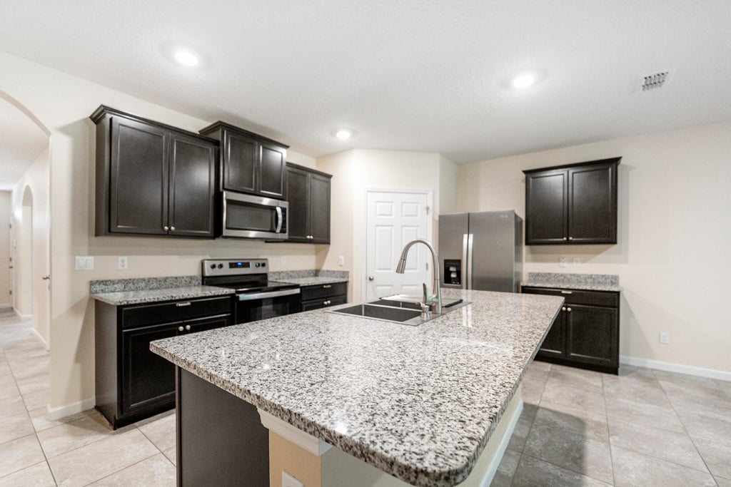 Photo of 6007 NW Regent Street, Port Saint Lucie, FL 34983 (MLS # R11076404)
